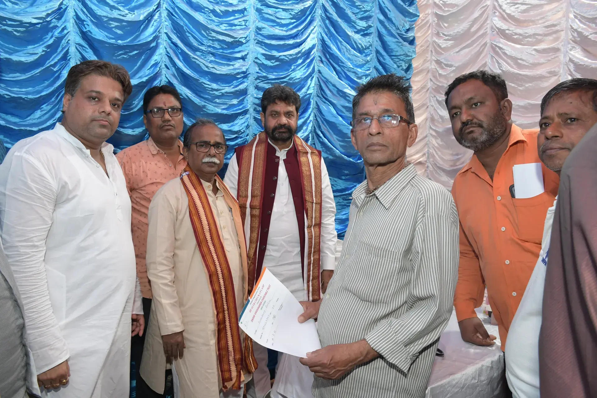 Rakesh Saha with BJP party workers at the health campaign