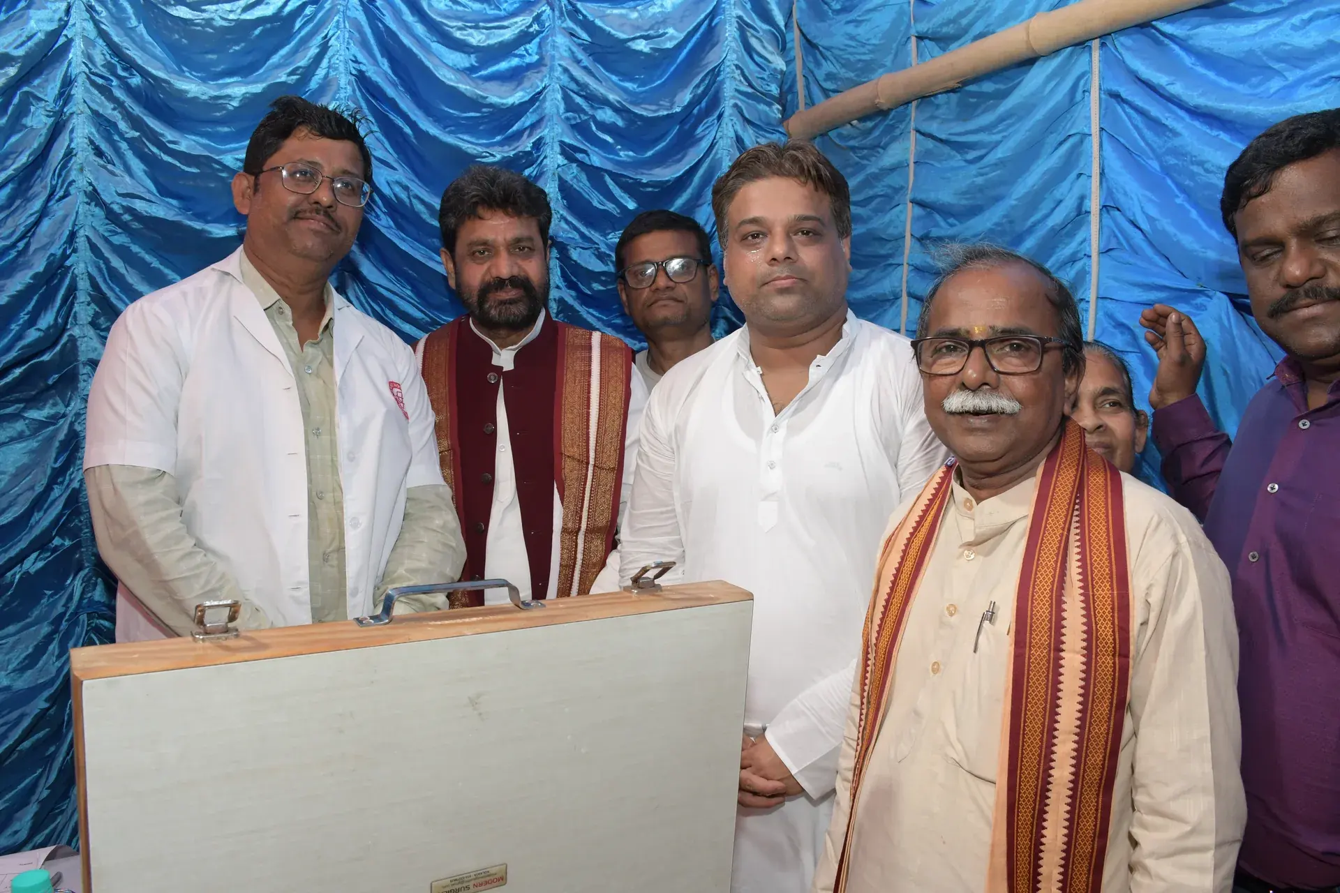 Rakesh Saha with doctors at the free health checkup camp